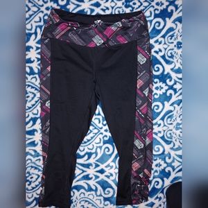 Maurices in Motion. Athletic capris. Size Med. Black, purple and pink.